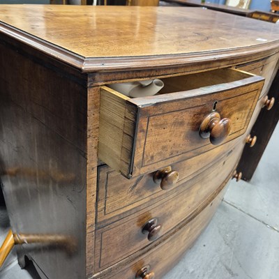 Lot 581 - An ebony line inlaid mahogany bow front chest...