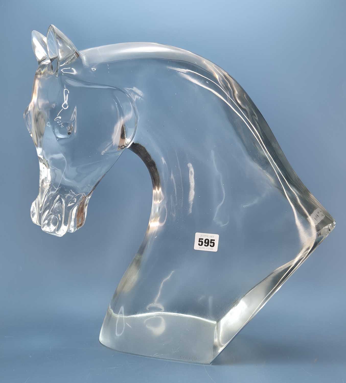 Lot 595 - A Lalique clear glass head of a horse, incised...