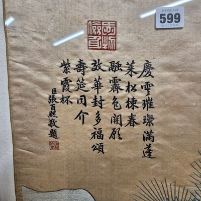 Lot 599 - A Chinese framed silk panel sewn with two bats...