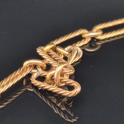 Lot 539 - An antique 15-carat gold watch Albert chain...
