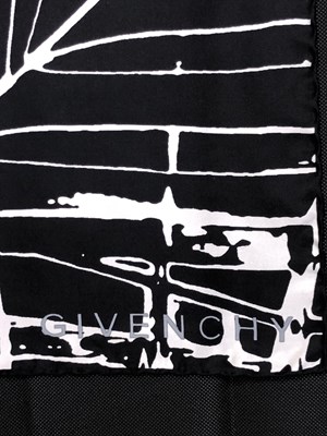 Lot 1117 - Givenchy, a vintage silk scarf. Black, white...
