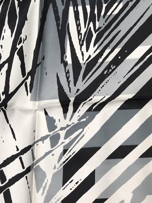 Lot 1117 - Givenchy, a vintage silk scarf. Black, white...