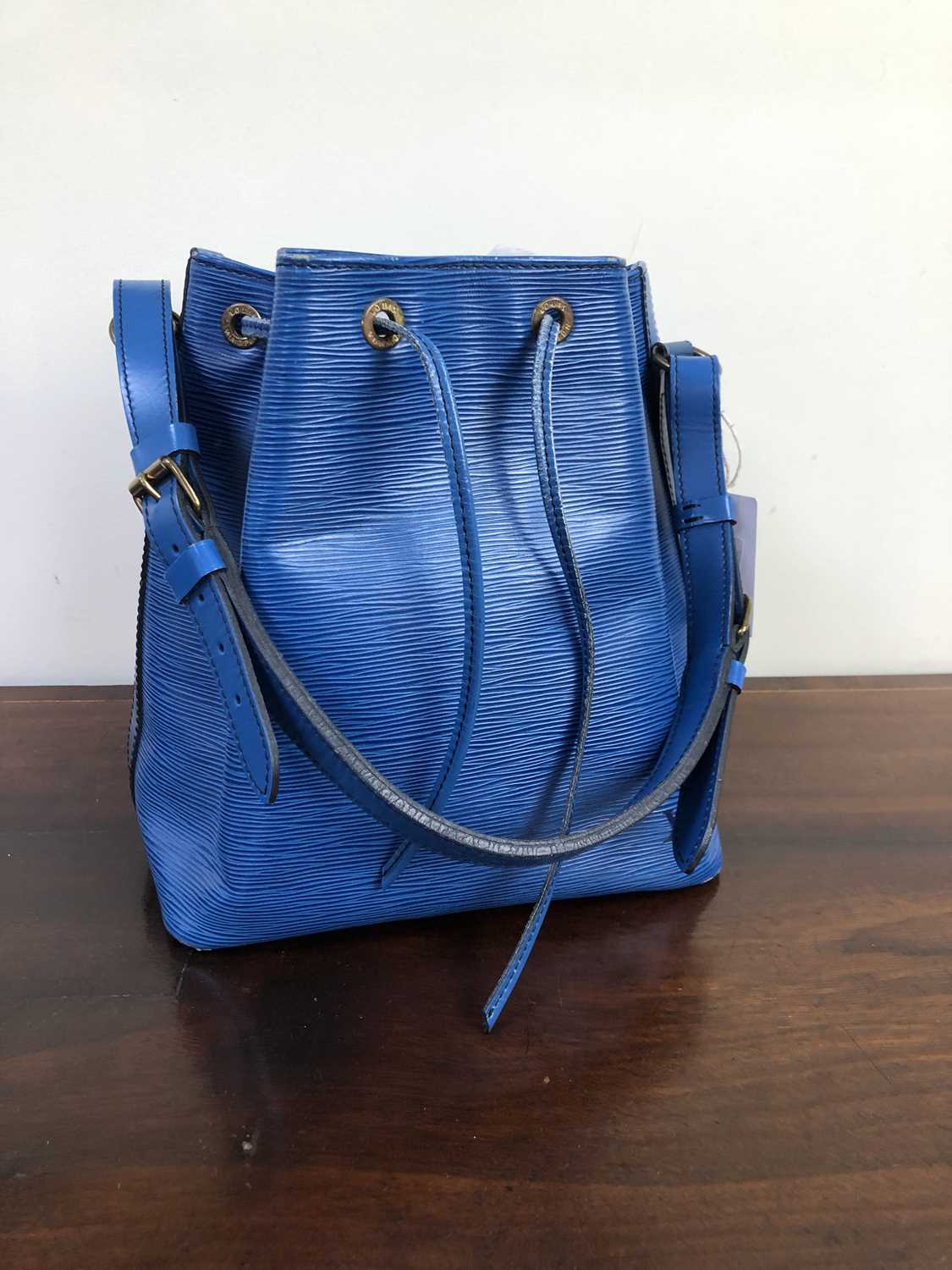 Lot 1145 - Louis Vuitton -Blue Toledo Leather Petit Noe Bag.