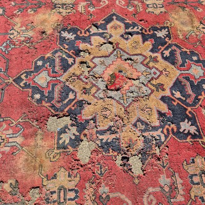 Lot 620 - An antique Turkish Oushak carpet