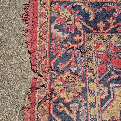 Lot 620 - An antique Turkish Oushak carpet