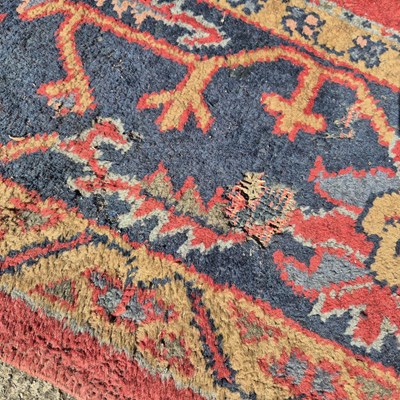 Lot 620 - An antique Turkish Oushak carpet