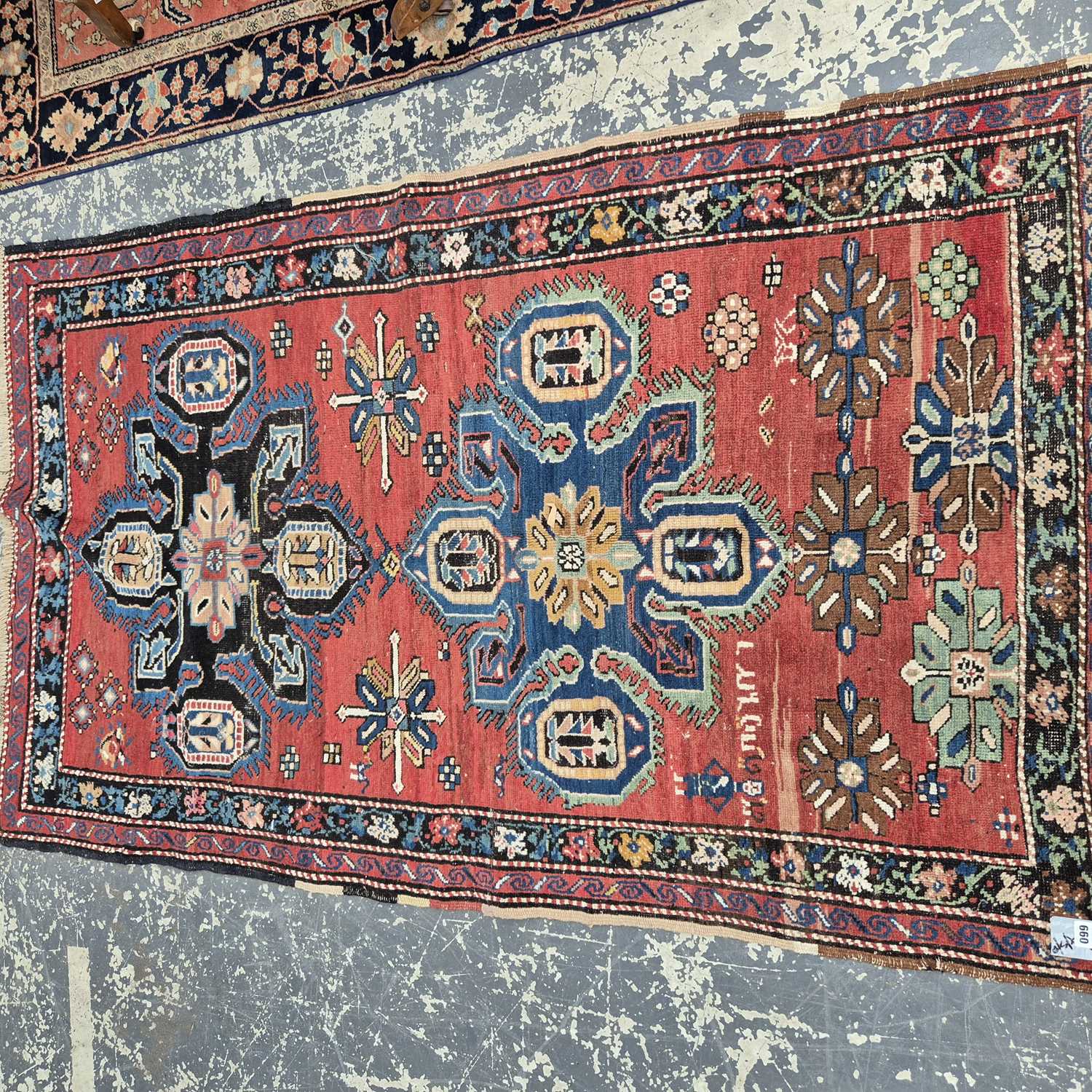 Lot 660 - An antique caucasian Karabagh rug. 118 x 190 cm