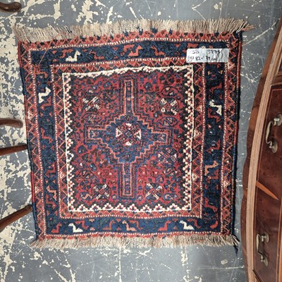 Lot 643 - A Persian Shiraz rug 82 x 79 cm, together with...