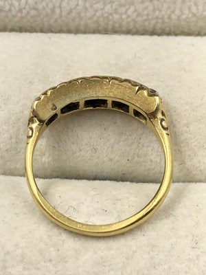 Lot 1043 - A vintage five-stone graduated diamond ring....
