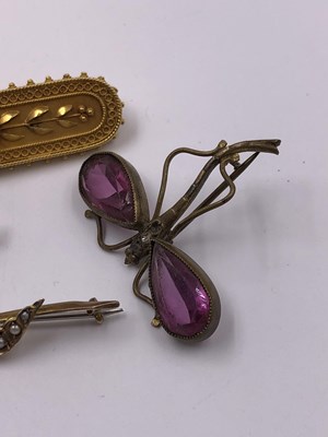 Lot 1045 - A collection of four vintage brooches,...