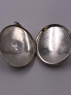 Lot 1005 - A large hallmarked silver engraved portrait...