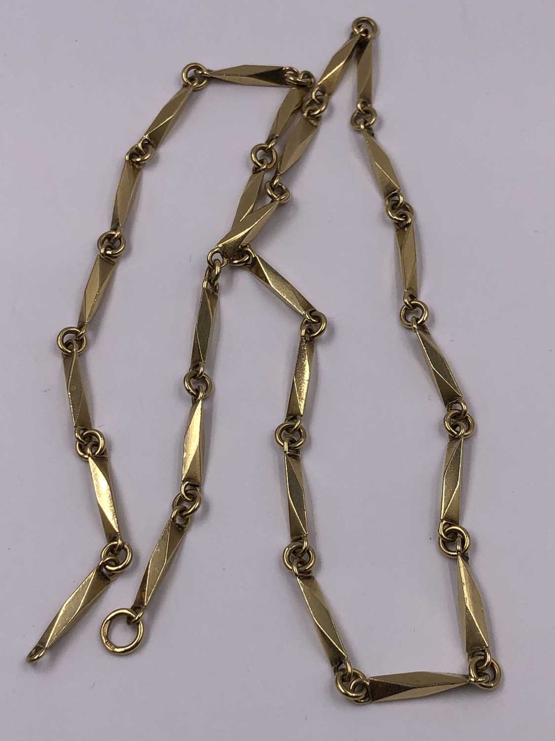 Lot 1012 - A 9ct hallmarked solid gold fancy link...