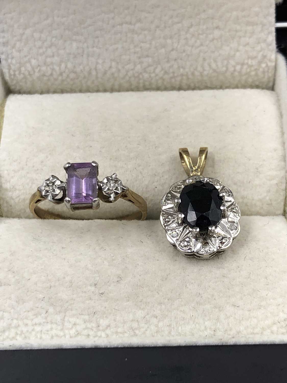 Lot 1028 - A 9ct hallmarked gold amethyst and diamond...