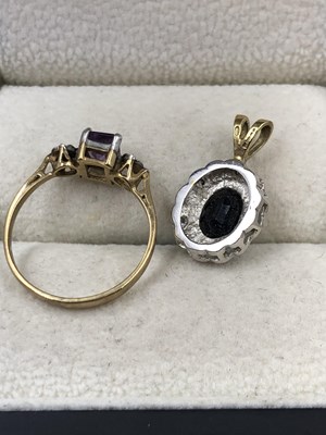 Lot 1028 - A 9ct hallmarked gold amethyst and diamond...