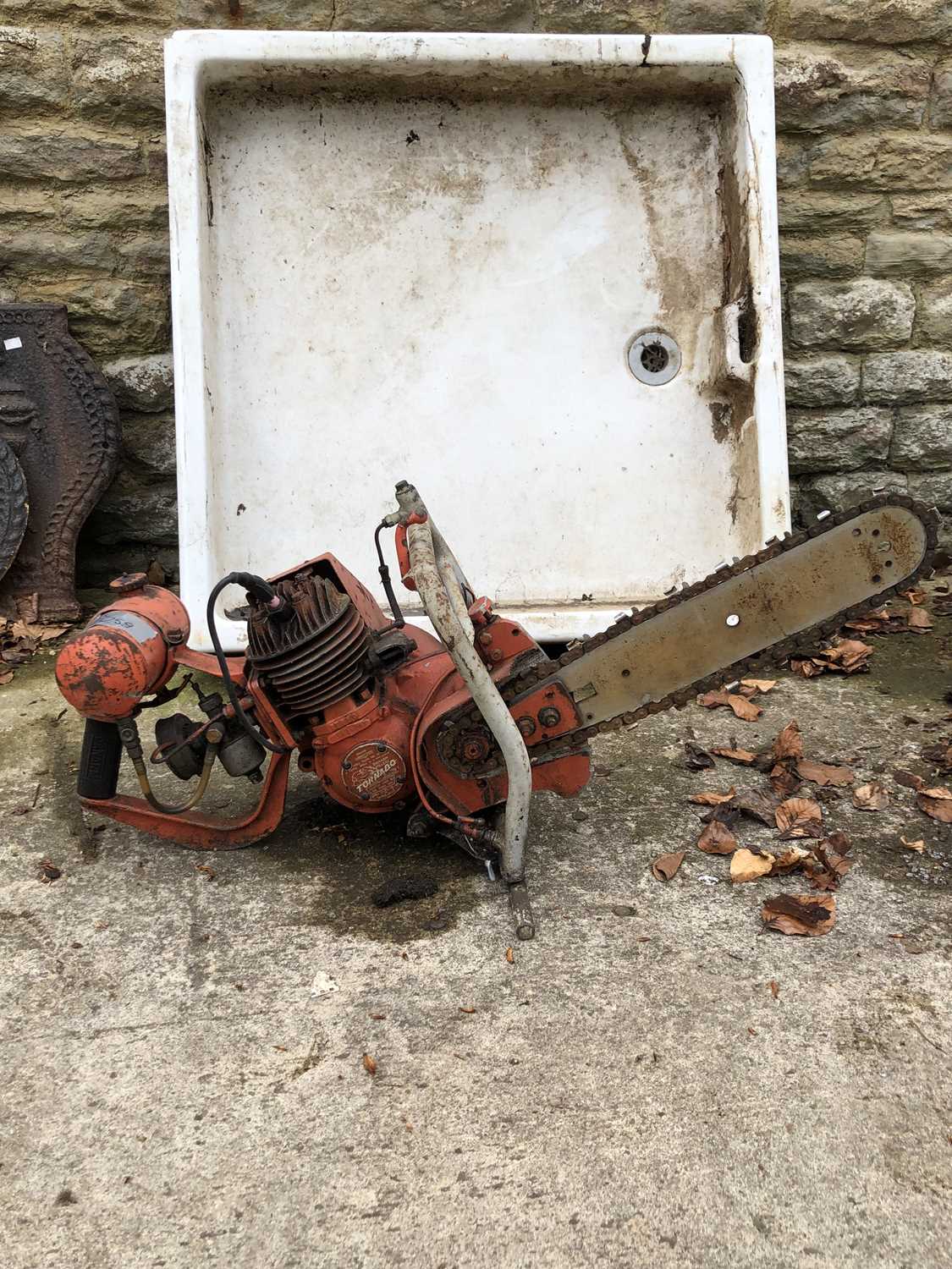 Lot 1259 - A large heavy petrol chainsaw.
