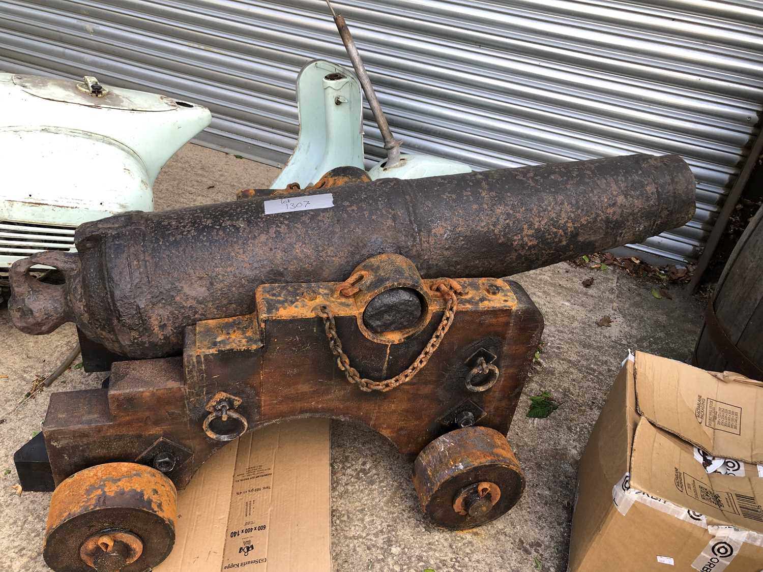 Lot 1307 - An impressive 18th century iron cannon on a...