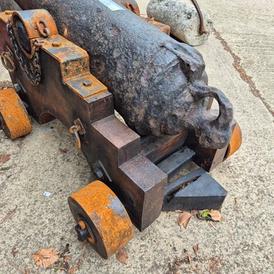 Lot 1307 - An impressive 18th century iron cannon on a...