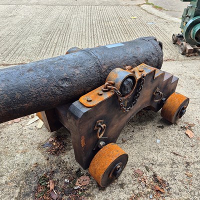 Lot 1307 - An impressive 18th century iron cannon on a...