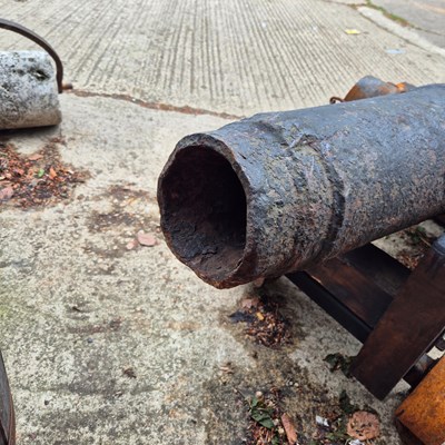 Lot 1307 - An impressive 18th century iron cannon on a...