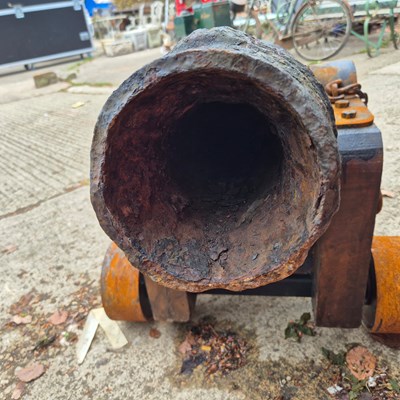Lot 1307 - An impressive 18th century iron cannon on a...