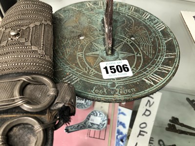 Lot 1506 - An Arabian dagger together with a bronze sundial
