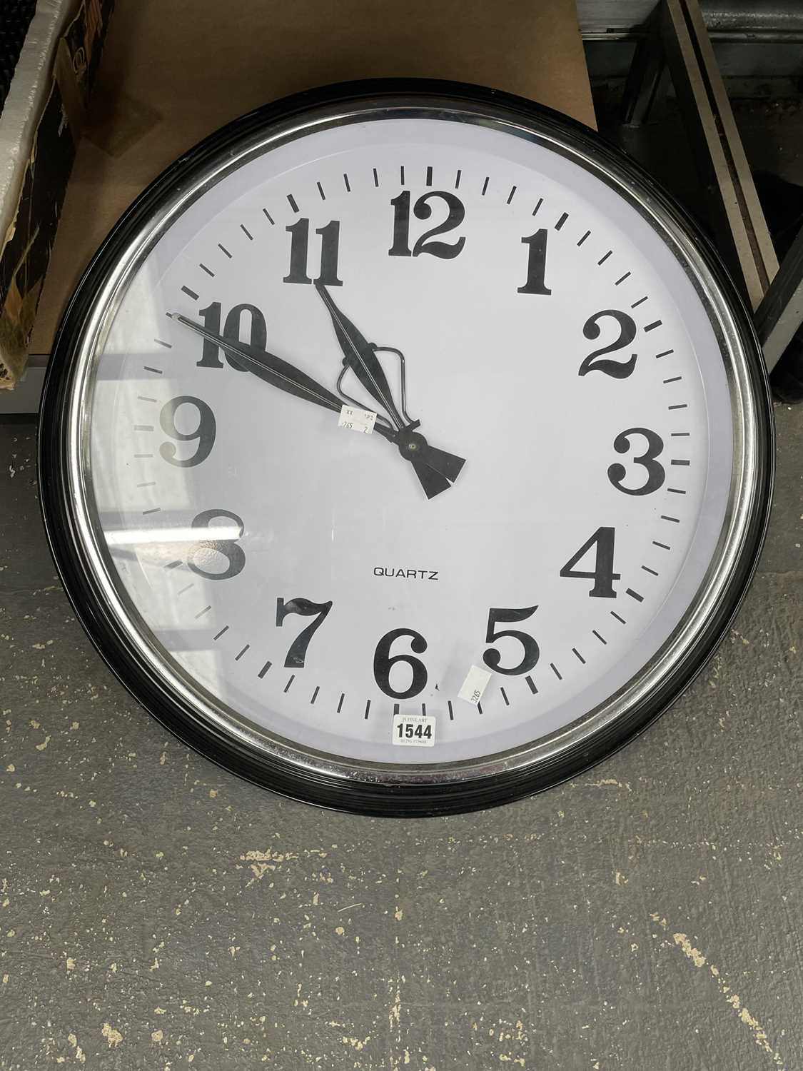 Lot 1544 - A Quartz wall clock