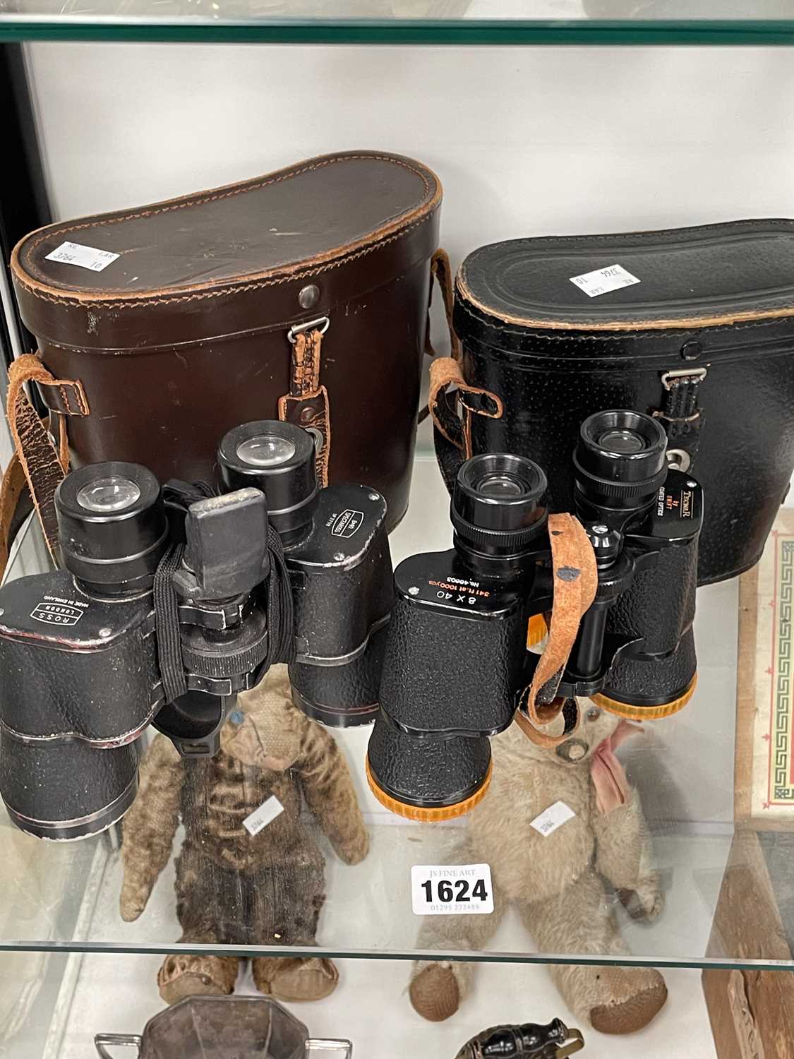 Lot 1624 - Two pairs of leather cased binoculars