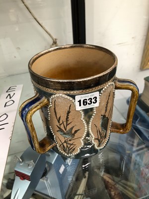 Lot 1633 - A silver rimmed Doulton Tyg decorated by...