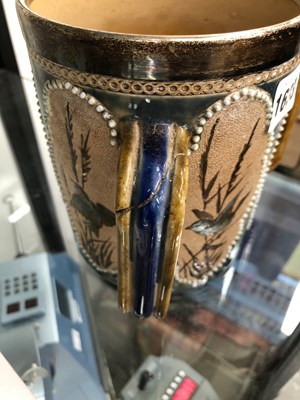 Lot 1633 - A silver rimmed Doulton Tyg decorated by...