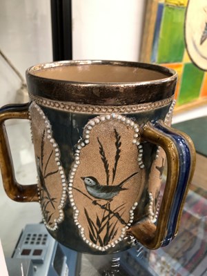 Lot 1633 - A silver rimmed Doulton Tyg decorated by...