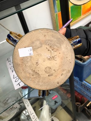 Lot 1633 - A silver rimmed Doulton Tyg decorated by...