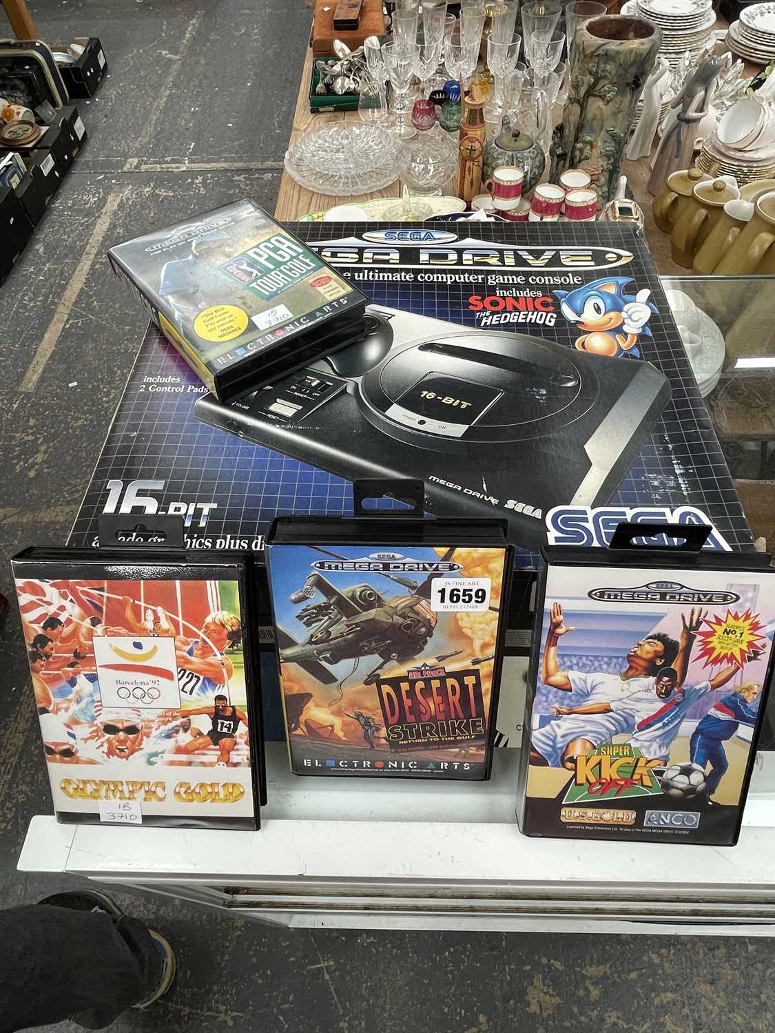 Lot 1659 - A boxed Sega Mega drive play station together...