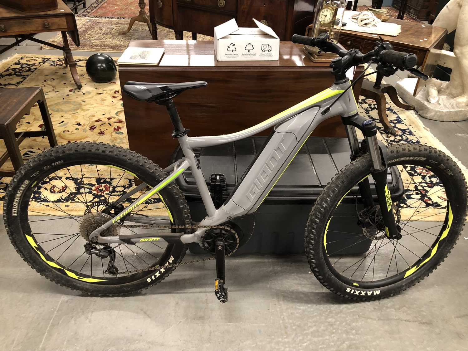Lot 1390 - A Fathom Giant electric bicycle and charger.