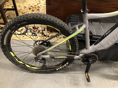 Lot 1390 - A Fathom Giant electric bicycle and charger.