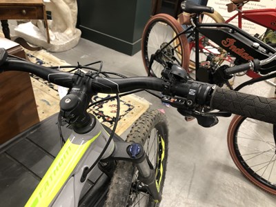Lot 1390 - A Fathom Giant electric bicycle and charger.