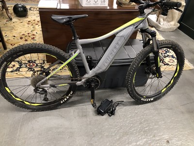 Lot 1390 - A Fathom Giant electric bicycle and charger.