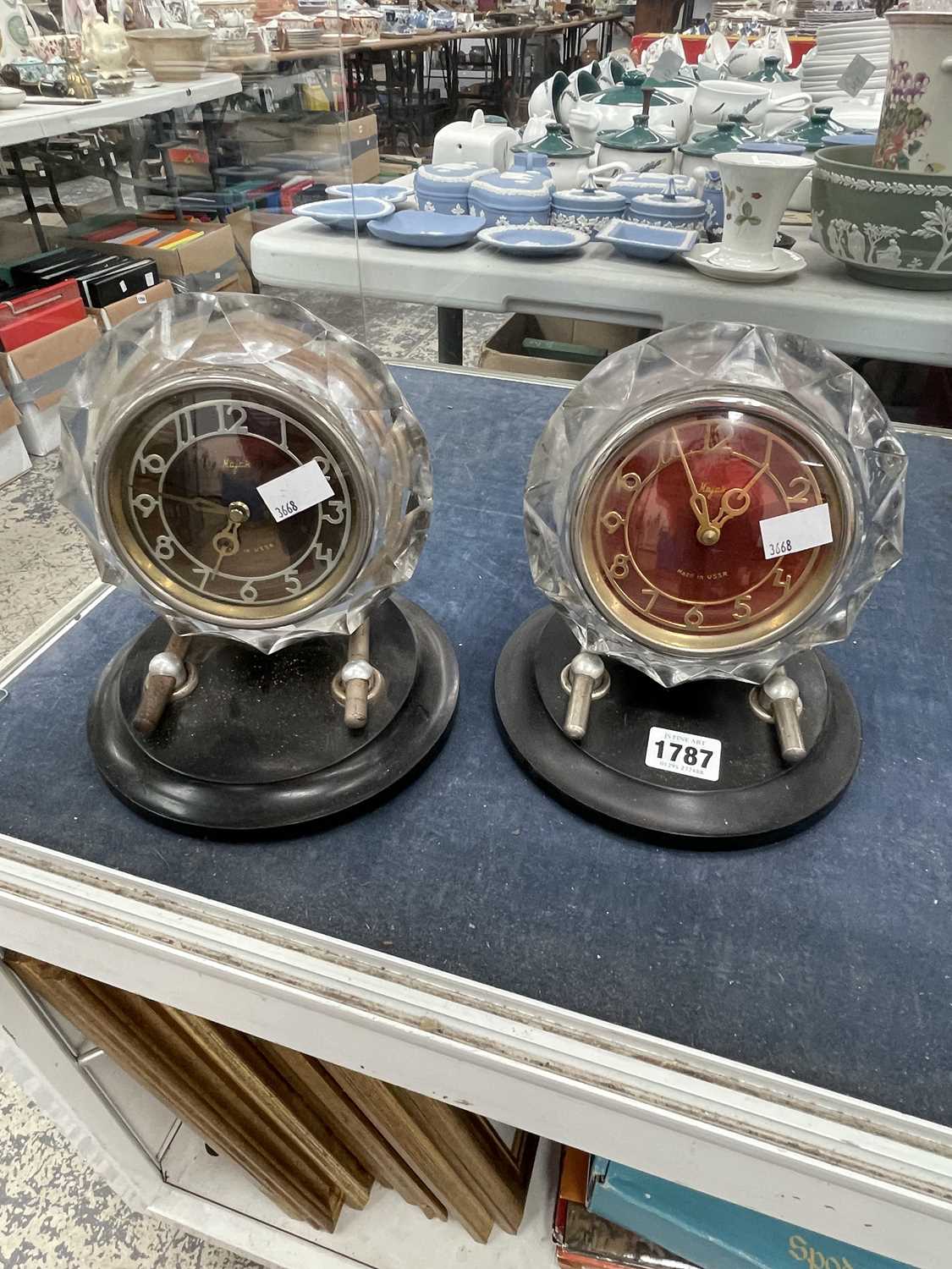 Lot 1787 - Two similar Russian clock raised on circular...