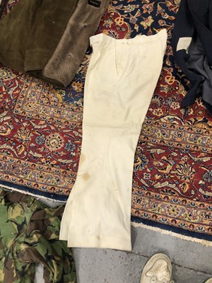 Lot 1805 - A suitcase containing a RAF great coat,...