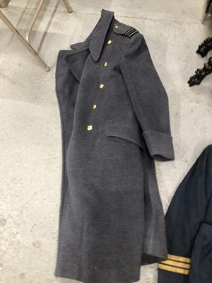 Lot 1805 - A suitcase containing a RAF great coat,...