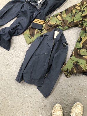 Lot 1805 - A suitcase containing a RAF great coat,...