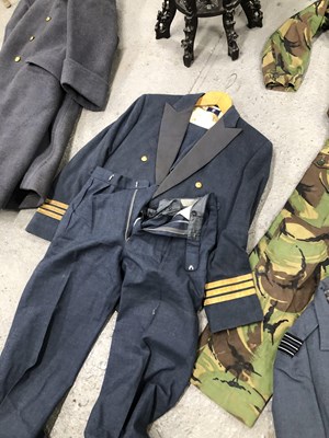 Lot 1805 - A suitcase containing a RAF great coat,...