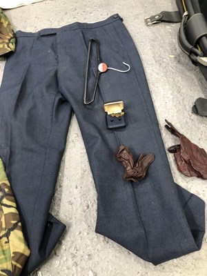Lot 1805 - A suitcase containing a RAF great coat,...