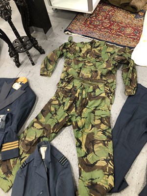 Lot 1805 - A suitcase containing a RAF great coat,...
