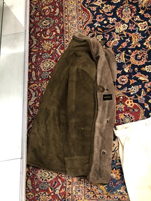 Lot 1805 - A suitcase containing a RAF great coat,...