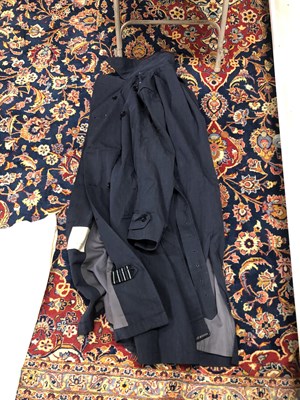 Lot 1805 - A suitcase containing a RAF great coat,...