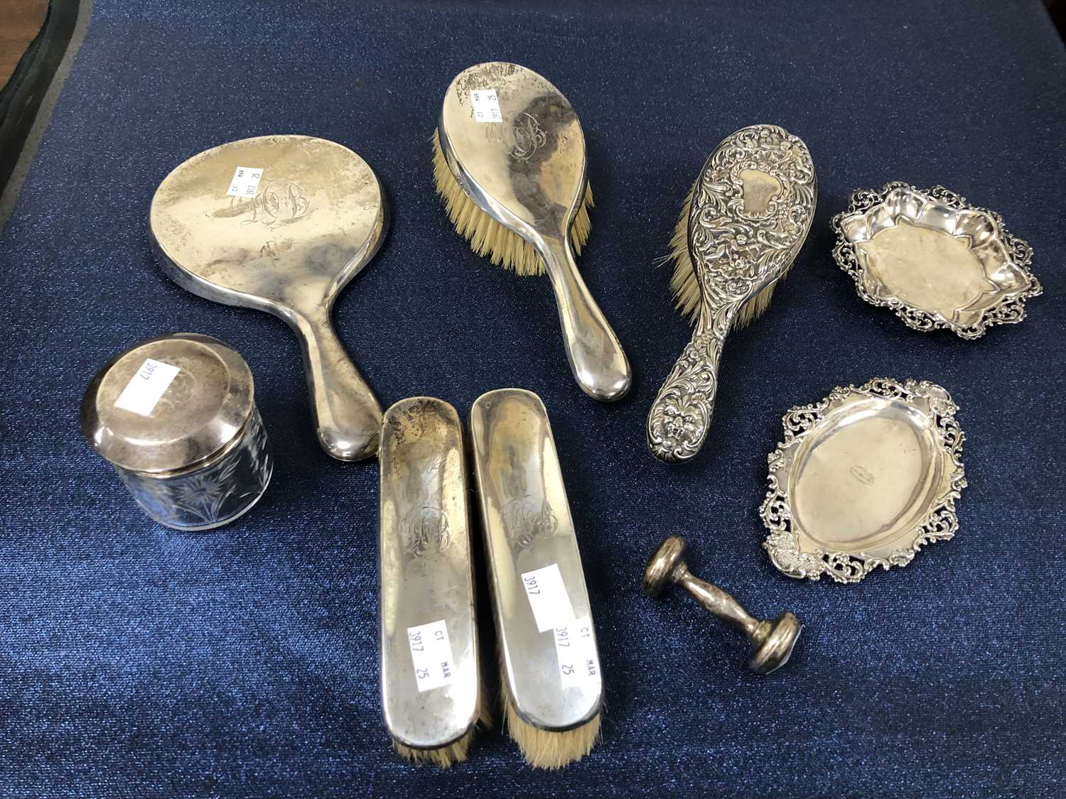 Lot 1078 - Hallmarked silver to include a five-piece...