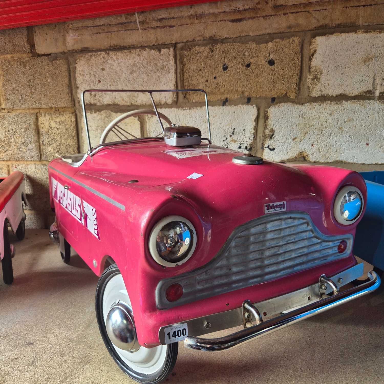 Lot 1400 - A rare 1960's Tri-Ang pedal car with Pegasus...