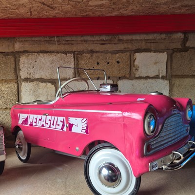 Lot 1400 - A rare 1960's Tri-Ang pedal car with Pegasus...