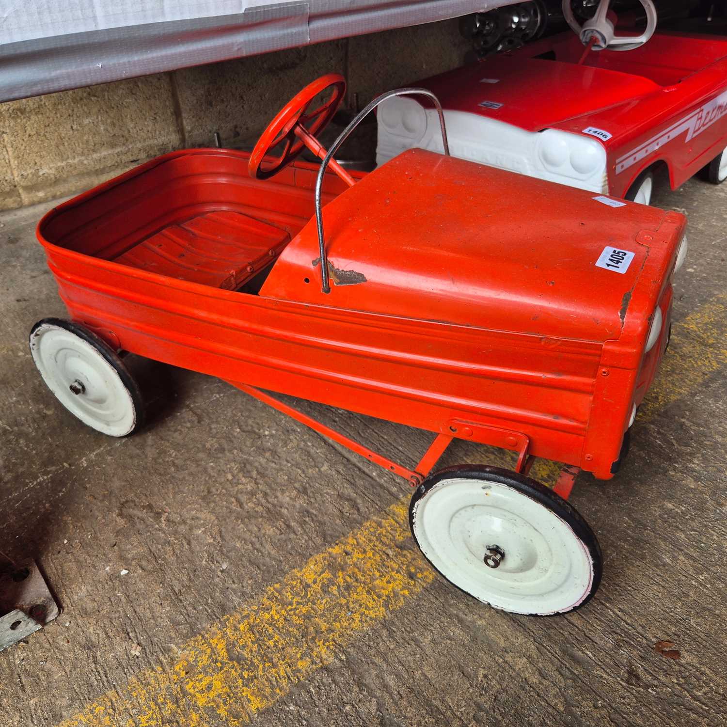 Lot 1405 - A Vintage Tri-Ang Comet, tinplate pedal car.