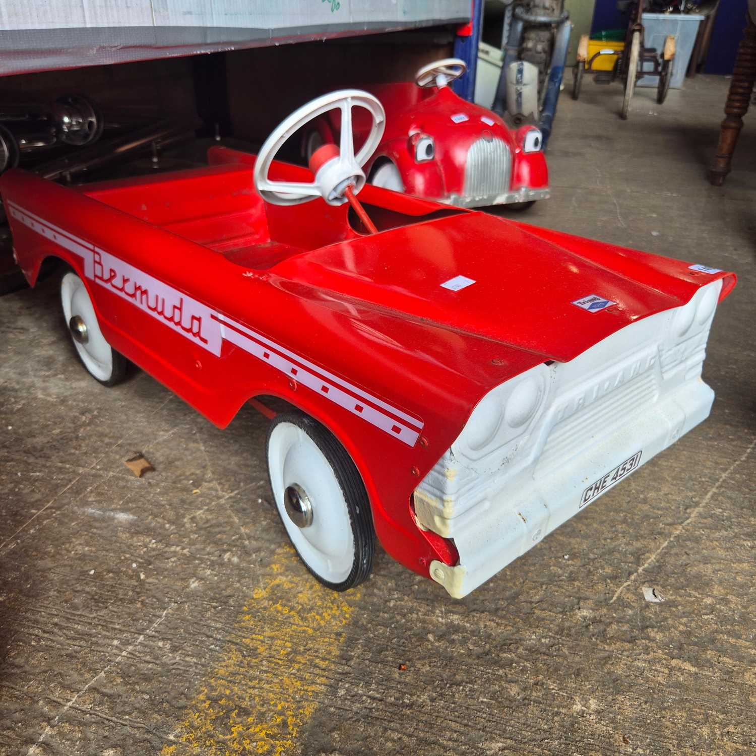 Lot 1406 - A vintage Tri-Ang Bermuda, tin plate pedal car.